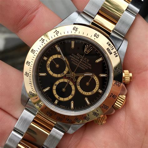 rolex daytona black dial diamonds|rolex daytona gold diamond bezel.